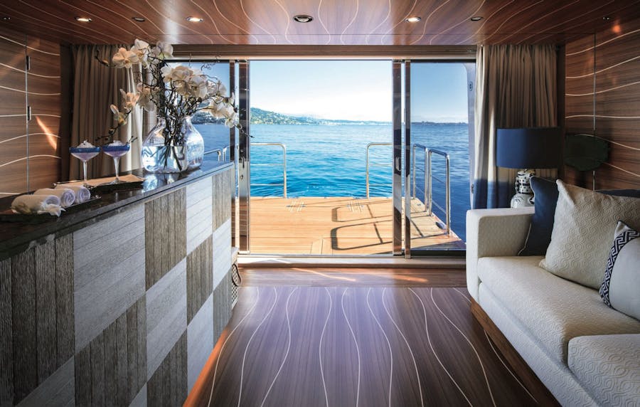 Interior shot with opened doors looking out to the swim platform. >