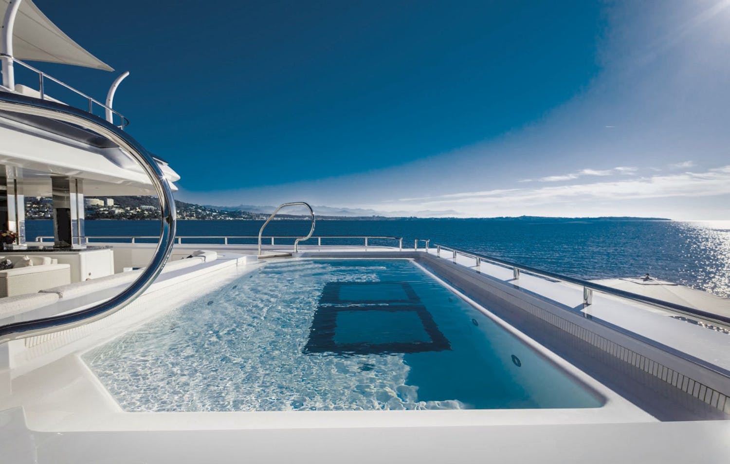 Long outdoor pool on the aft deck. >