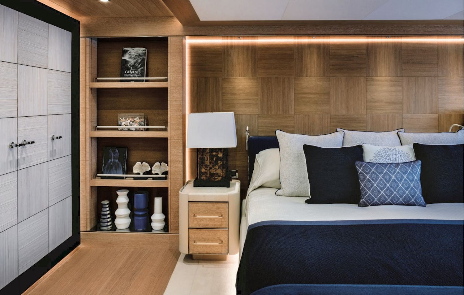 Cabin bed, side table, book shelf and closet. >