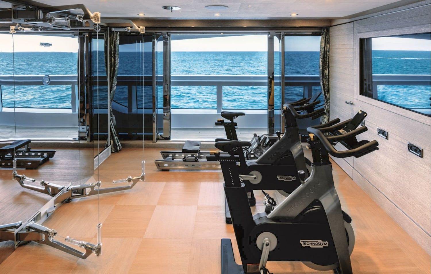 Interior gym looking out the starboard of the boat. >